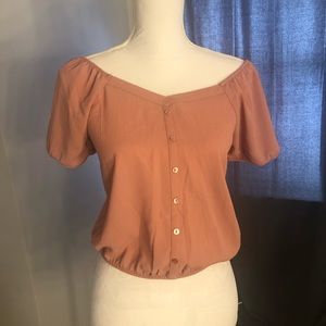 Pink blouse with buttons up the front